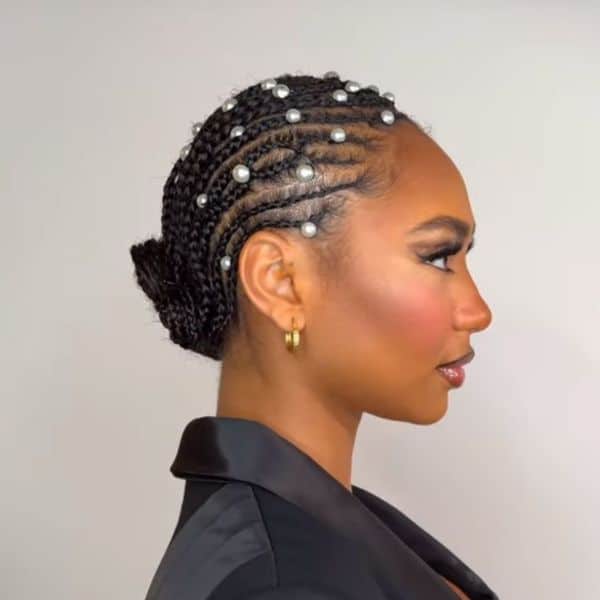 Intricate braids with pearls by Pashcan’el Mitchell